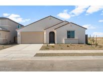 Charming single-story home featuring a neutral color palette, low maintenance desert landscaping, and attached two-car garage at 42850 W Palo Abeto Dr, Maricopa, AZ 85138