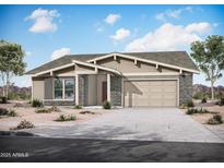 Charming single-story home featuring desert landscaping and a two-car garage at 44815 N 44Th Dr, Phoenix, AZ 85087