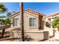 Charming single-story home with a cozy front porch and desert landscaping at 726 S Nebraska St # 91, Chandler, AZ 85225