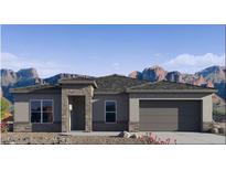Charming single-story home featuring desert landscaping and a stone-accented entryway with mountain views at 25606 N 154Th Ln, Surprise, AZ 85387