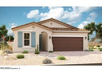 Charming single-story home featuring a tile roof, light stucco, blue shutters, and a two-car garage at 39967 W Anne Ln, Maricopa, AZ 85138