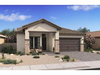 Charming single-story home featuring desert landscaping, a two-car garage, and a cozy front porch sitting area at 520 E Aurora Dr, San Tan Valley, AZ 85140