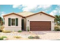 Charming single-story home with a two-car garage, neutral stucco, decorative shutters and a tile roof at 21535 N Rummler Ln, Maricopa, AZ 85138