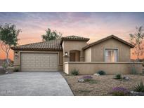 Charming single-story home featuring a desert landscape, inviting entryway, and two car garage at 42855 W Palo Abeto Dr, Maricopa, AZ 85138