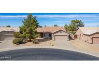 Quaint single-Gathering home featuring mature trees, well-kept landscaping and a two-car garage at 6450 S Windstream Pl, Chandler, AZ 85249