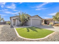 Charming single-story home featuring a well-maintained yard and attached two-car garage at 1145 E Silktassel Trl, San Tan Valley, AZ 85143