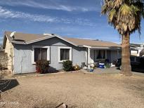 Charming single story home with a mature palm tree adding curb appeal at 4622 N 82Nd Ln, Phoenix, AZ 85033