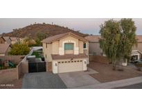 Charming two-story home with desert landscaping, mountain views, and a two car garage at 2226 E Parkside Ln, Phoenix, AZ 85024