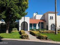 Inviting two story home with well maintained front yard and desert landscaping at 7161 E Mcdonald E Dr # 2, Paradise Valley, AZ 85253