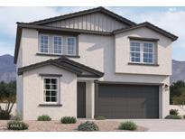Beautiful two-story home with a neutral color palette, well manicured landscape, and a two car garage at 37713 N Cowboy Ln, San Tan Valley, AZ 85140