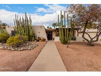 Inviting single-story home featuring desert landscaping and a charming courtyard entry at 4626 S Kachina Dr, Tempe, AZ 85282