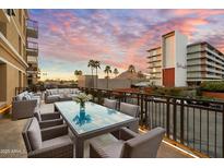 Inviting outdoor patio with stylish furniture and a gorgeous view, perfect for relaxing and entertaining at 6803 E Main St # 2210, Scottsdale, AZ 85251