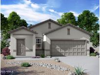 Charming single-story home with a two-car garage and a beautifully landscaped front yard at 24174 W Hidalgo Ave, Buckeye, AZ 85326