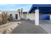 Charming single-story home featuring desert landscaping and a covered carport in a quiet neighborhood at 3133 W Christy Dr, Phoenix, AZ 85029