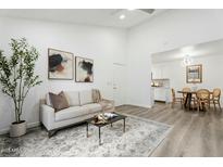 Bright living room featuring modern decor, sleek furniture, and artful accents at 1942 S Emerson -- # 222, Mesa, AZ 85210