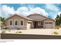 Charming single-story home with neutral stucco, brick accents, three windows, and a two car garage at 21960 E Saddle Ct, Queen Creek, AZ 85142