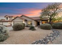 Charming single-story home featuring a well-manicured front yard and a two car garage at 4317 E Williams Dr, Phoenix, AZ 85050