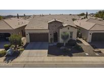 Charming single-story home featuring desert landscaping, tile roof, and a two-car garage at 1775 E Tangelo Pl, Queen Creek, AZ 85140