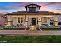 Charming single-Gathering home with a welcoming porch and well-manicured lawn in a peaceful neighborhood at 2733 E Virginia St, Gilbert, AZ 85296