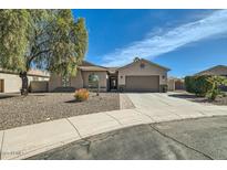 Charming single-story home with desert landscaping, a two-car garage, and a covered entryway at 5225 S Opal Pl, Chandler, AZ 85249