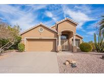 Charming single-Gathering home with a well-maintained front yard, desert landscaping, and a two-car garage at 15237 S 47Th Way, Phoenix, AZ 85044