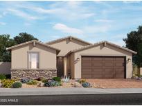 Charming single-story home with a two-car garage, neutral stucco, stone accents, and desert landscaping at 4248 W Hannah St, San Tan Valley, AZ 85144