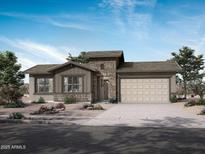 Beautiful single-Gathering home featuring stone accents, a two-car garage, and low-maintenance landscaping at 44717 N 44Th Dr, Phoenix, AZ 85087