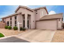 Charming two-story home with attached garage, neutral paint, and low-maintenance landscaping at 16036 N 11Th Ave # 1126, Phoenix, AZ 85023