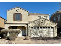 Charming two-story home featuring a large two-car garage and neutral stucco exterior at 2344 W Barwick Dr, Phoenix, AZ 85085