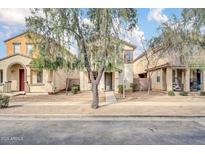 Charming home exterior featuring a cozy, two-story design and landscaped front yard at 110 N 66Th Ave, Phoenix, AZ 85043