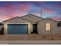 Charming single-story home featuring a blue garage door and inviting front entrance at 4280 W Hannah St, San Tan Valley, AZ 85144