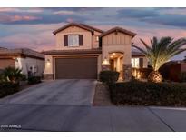 Charming two-story home with a two-car garage and desert landscaping at 5539 S Verde --, Mesa, AZ 85212