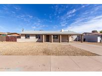 Charming single-story home with low-maintenance landscaping and covered parking, perfect for first-time buyers at 4813 N 62Nd Ave, Phoenix, AZ 85033