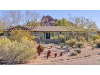 Charming single story home with desert landscaping and mountain views at 2409 N 57Th St, Scottsdale, AZ 85257