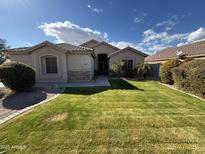 Charming single-story home featuring a lush green lawn and well-maintained landscaping at 2780 S Pleasant Pl, Chandler, AZ 85286