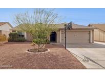 Charming single-story home featuring a well-maintained front yard, and a basketball hoop at 3023 E John Cabot Dr, Phoenix, AZ 85032