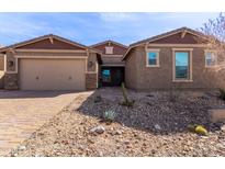 Charming single-Gathering home with a two-car garage and low-maintenance desert landscaping at 3025 W Night Owl Ln, Phoenix, AZ 85085