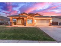 Charming single-story home featuring a well-manicured lawn and covered porch perfect for relaxing at 3768 S Coach House Dr, Gilbert, AZ 85297