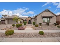 Beautiful single-story home featuring a stone facade, tile roof, and professionally landscaped front yard at 19318 E Walnut Rd, Queen Creek, AZ 85142