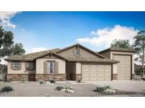 Charming single-story home with desert landscaping, neutral paint, and a 3-car garage at 18364 W Navajo St, Goodyear, AZ 85338