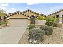 Charming single-story home with a two-car garage and low maintenance desert landscaping at 10226 E Pine Valley Rd, Scottsdale, AZ 85255
