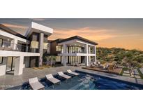 Stunning modern home featuring a private pool, outdoor lounge, and sleek architectural design at 16856 N Mountain Pkwy, Fountain Hills, AZ 85268