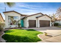 Charming single-story home with a well-manicured lawn, inviting curb appeal, and a two-car garage at 1737 E Marquette Dr, Gilbert, AZ 85234