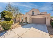 Charming two-story home with a well-manicured lawn, inviting entrance and a spacious two car garage at 1777 E Dubois Ave, Gilbert, AZ 85298