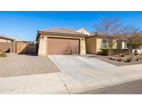 Charming single story home with a two car garage and low maintenance landscaping at 19202 W Jackson St, Buckeye, AZ 85326