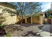 Charming home with a gravel front yard, mature landscaping, and covered front porch at 14851 N 25Th Dr # 11, Phoenix, AZ 85023