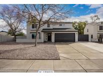 Charming two-story home with a well-manicured yard and a spacious two-car garage at 19409 N 45Th Dr, Glendale, AZ 85308