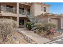 Charming condo featuring well-maintained landscaping, private balconies, and convenient stairway access at 11616 N Saguaro Blvd # 2, Fountain Hills, AZ 85268