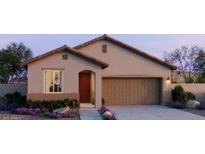 Charming single-story home featuring desert landscaping and an attached two-car garage at 25180 W Wayland Dr, Buckeye, AZ 85326