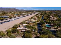 Stunning aerial view of SkyRanch at Carefree homes along a private airstrip runway and serene desert landscape at 8502 E Cave Creek Rd # 10, Carefree, AZ 85377